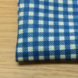 pochette disegno vichy colore blu stampata su tessuto lino puro made inItaly