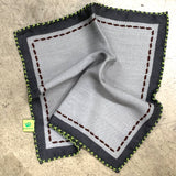 CASHMERE, SILK AND WOOL PRINTED POCKET SQUARE, COLOR GREY WITH GREEN STITCHING. COD 030